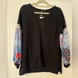 Amazon Black Waffle Knit with Colorful Patterned Sleeves Sz M